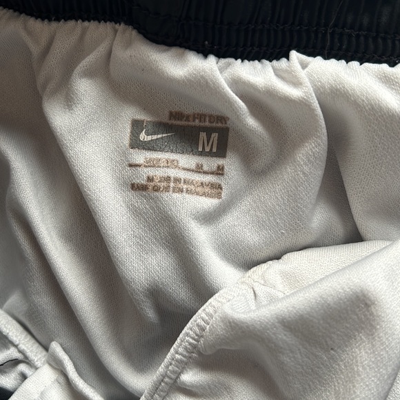 Black. Very cute in good condition. Nike athletic shorts. - Picture 2 of 3